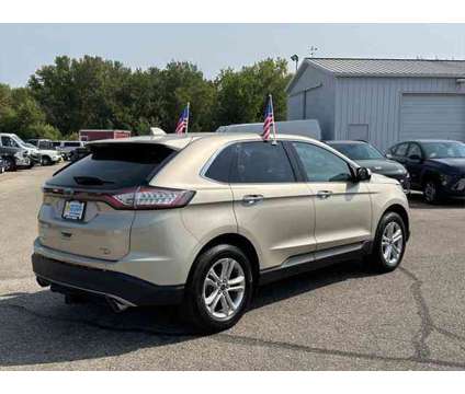 2017 Ford Edge SEL is a Gold, White 2017 Ford Edge SEL SUV in Rochester MN