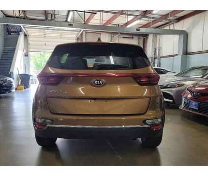 2020 Kia Sportage LX is a Gold 2020 Kia Sportage LX Car for Sale in Fredericksburg VA