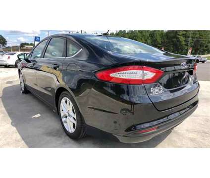 2015 Ford Fusion SE is a Black 2015 Ford Fusion SE Sedan in Anderson SC