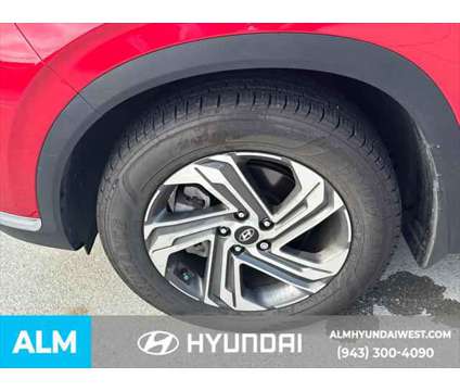 2023 Hyundai Santa Fe SEL is a Red 2023 Hyundai Santa Fe SUV in Lithia Springs GA