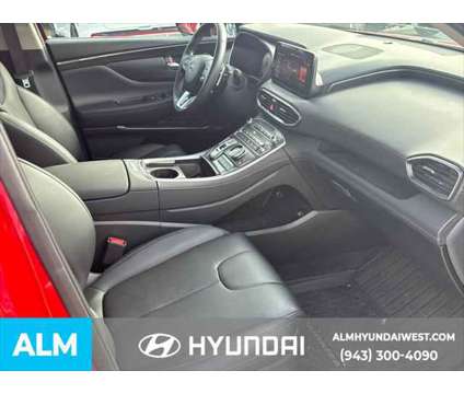 2023 Hyundai Santa Fe SEL is a Red 2023 Hyundai Santa Fe SUV in Lithia Springs GA