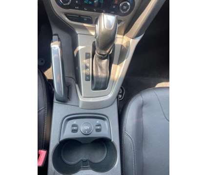 2012 Ford Focus SEL is a White 2012 Ford Focus SEL Hatchback in Milford CT