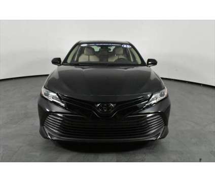 2020 Toyota Camry LE is a Black 2020 Toyota Camry LE Sedan in Orlando FL