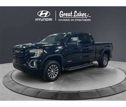 2020 GMC Sierra 1500 4WD Crew Cab Standard Box AT4 is a Black 2020 GMC Sierra 1500 Truck in Streetsboro OH