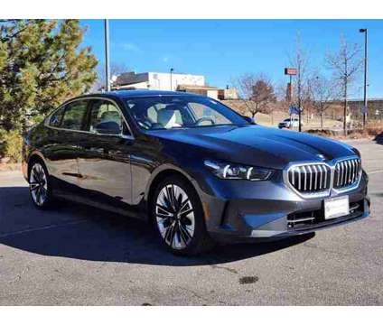 2024 BMW 5 Series i xDrive is a Grey 2024 BMW 5-Series Sedan in Loveland CO