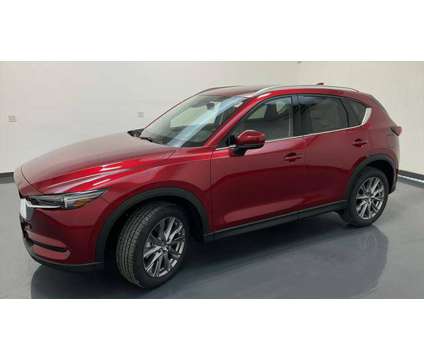 2021 Mazda CX-5 Grand Touring Reserve is a Red 2021 Mazda CX-5 Grand Touring SUV in Waterloo IA