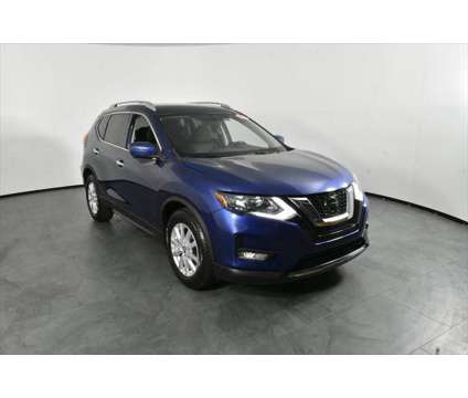 2018 Nissan Rogue SV is a Blue 2018 Nissan Rogue SV Station Wagon in Orlando FL