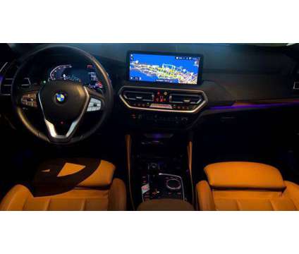 2022 BMW X4 xDrive30i is a Grey 2022 BMW X4 xDrive30i SUV in Huntington Station NY