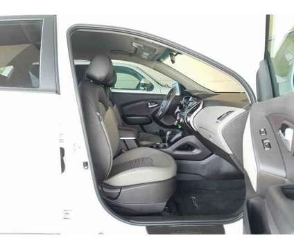 2013 Hyundai Tucson GLS is a White 2013 Hyundai Tucson GLS SUV in Brookshire TX