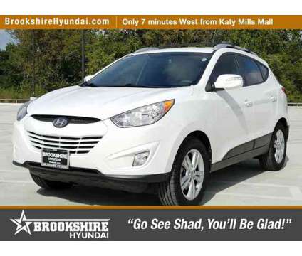 2013 Hyundai Tucson GLS is a White 2013 Hyundai Tucson GLS SUV in Brookshire TX