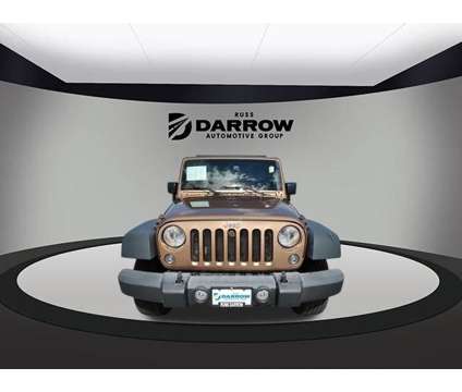 2015 Jeep Wrangler Unlimited Sport is a Brown 2015 Jeep Wrangler Unlimited SUV in West Bend WI