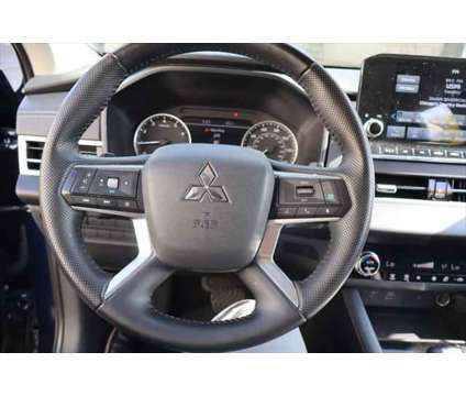 2024 Mitsubishi Outlander SE 2.5 S-AWC is a Blue 2024 Mitsubishi Outlander SE SUV in Libertyville IL