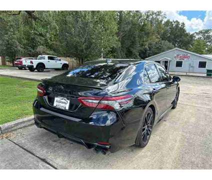 2022 Toyota Camry XSE is a Black 2022 Toyota Camry XSE Sedan in Hammond LA