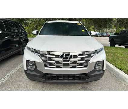 2023 Hyundai Santa Cruz SE is a White 2023 Truck in Vero Beach FL