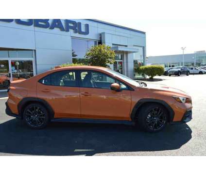 2024 Subaru WRX Premium is a Orange 2024 Subaru WRX Premium Sedan in Highland Park IL