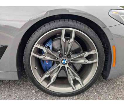 2021 BMW 5 Series xDrive is a Grey 2021 BMW 5-Series Sedan in Jacksonville FL