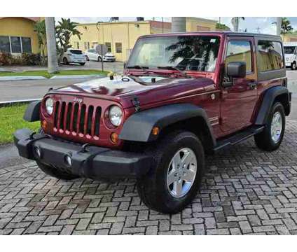 2013 Jeep Wrangler for sale is a Red 2013 Jeep Wrangler Car for Sale in Boca Raton FL