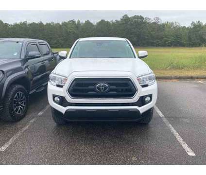 2023 Toyota Tacoma SR5 V6 is a Silver 2023 Toyota Tacoma SR5 Truck in Clanton AL