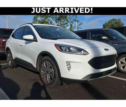 2021 Ford Escape SEL is a White 2021 Ford Escape SEL SUV in Saint Augustine FL