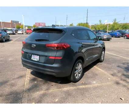 2021 Hyundai Tucson Value is a Blue 2021 Hyundai Tucson Value SUV in New Hudson MI