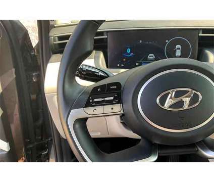 2024 Hyundai Tucson SEL is a Grey 2024 Hyundai Tucson SUV in Flint MI