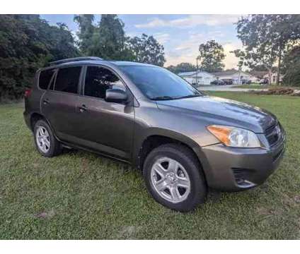 2011 Toyota RAV4 for sale is a Brown 2011 Toyota RAV4 2dr Car for Sale in Orange City FL