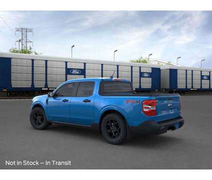 2024 Ford Maverick XLT is a Blue 2024 Ford Maverick Truck in Kansas City MO