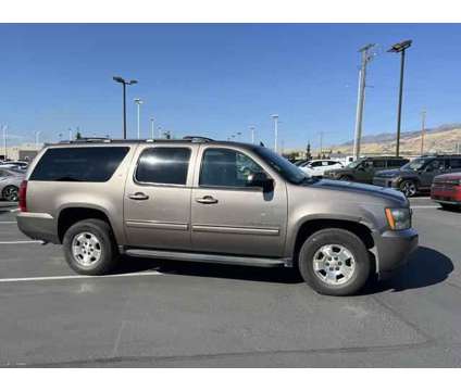 2012 Chevrolet Suburban LT is a Brown 2012 Chevrolet Suburban LT SUV in Logan UT