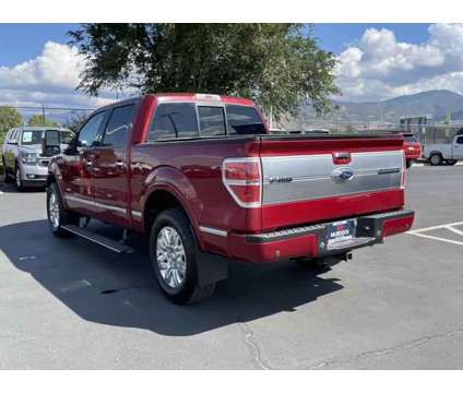 2014 Ford F-150 Platinum is a Red 2014 Ford F-150 Platinum Truck in Woods Cross UT