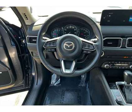 2021 Mazda CX-5 Grand Touring is a Blue 2021 Mazda CX-5 Grand Touring SUV in Milford MA