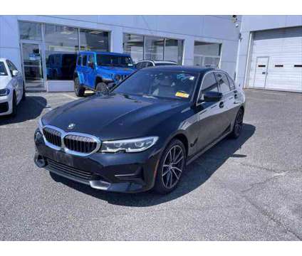 2021 BMW 3 Series xDrive is a Black 2021 BMW 3-Series Sedan in Freeport NY