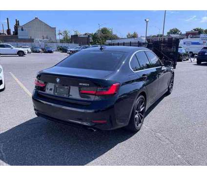 2021 BMW 3 Series xDrive is a Black 2021 BMW 3-Series Sedan in Freeport NY