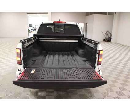 2023 Nissan Frontier Crew Cab PRO-4X 4x4 is a White 2023 Nissan frontier Truck in Cleveland TN