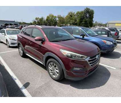 2017 Hyundai Tucson SE Plus is a Red 2017 Hyundai Tucson SE SUV in Knoxville TN