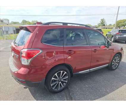 2017 Subaru Forester 2.0XT Touring is a Red 2017 Subaru Forester 2.0XT Touring Station Wagon in Dubuque IA