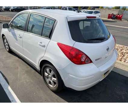 2007 Nissan Versa 1.8SL is a White 2007 Nissan Versa 1.8 SL Hatchback in Lindon UT