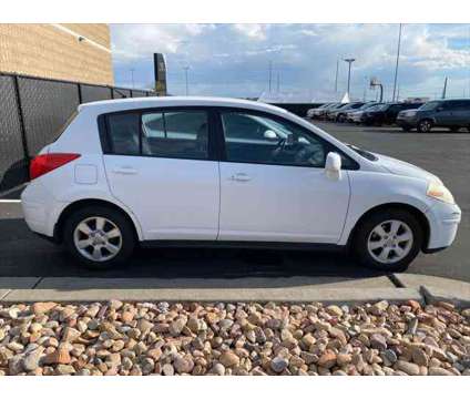 2007 Nissan Versa 1.8SL is a White 2007 Nissan Versa 1.8 SL Hatchback in Lindon UT