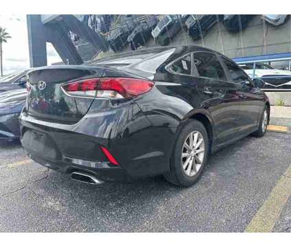 2019 Hyundai Sonata SE is a Black 2019 Hyundai Sonata SE Sedan in Orlando FL