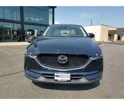 2021 Mazda CX-5 Grand Touring is a Blue 2021 Mazda CX-5 Grand Touring SUV in Elmhurst IL