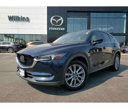 2021 Mazda CX-5 Grand Touring is a Blue 2021 Mazda CX-5 Grand Touring SUV in Elmhurst IL