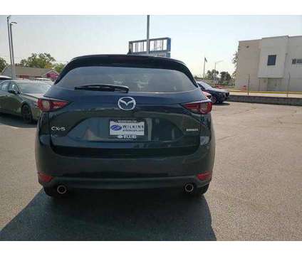 2021 Mazda CX-5 Grand Touring is a Blue 2021 Mazda CX-5 Grand Touring SUV in Elmhurst IL