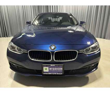 2018 BMW 3 Series xDrive is a Blue 2018 BMW 3-Series Sedan in Shrewsbury MA