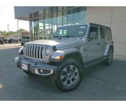 2019 Jeep Wrangler Unlimited Sahara 4x4 is a Silver 2019 Jeep Wrangler Unlimited Sahara SUV in Elmhurst IL