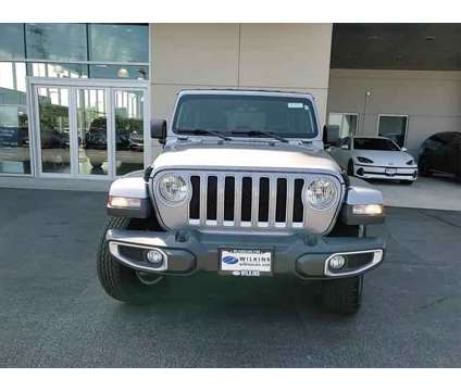 2019 Jeep Wrangler Unlimited Sahara 4x4 is a Silver 2019 Jeep Wrangler Unlimited Sahara SUV in Elmhurst IL