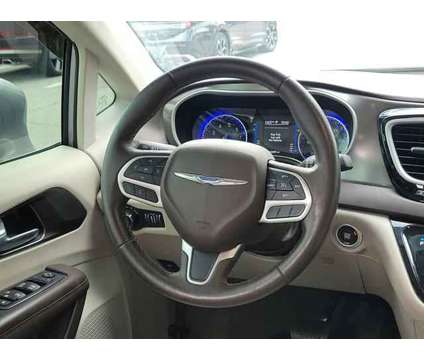 2017 Chrysler Pacifica Touring-L is a Silver 2017 Chrysler Pacifica Touring Van in Punta Gorda FL