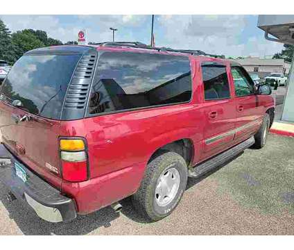 2006 GMC Yukon XL SLE 1500 is a Red 2006 GMC Yukon XL SLE SUV in Fergus Falls MN