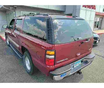 2006 GMC Yukon XL SLE 1500 is a Red 2006 GMC Yukon XL SLE SUV in Fergus Falls MN