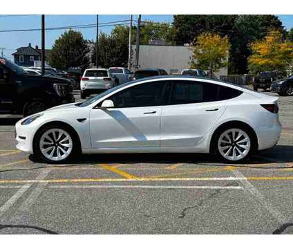 2022 Tesla Model 3 Long Range Dual Motor All-Wheel Drive is a White 2022 Tesla Model 3 Long Range Sedan in Milford MA