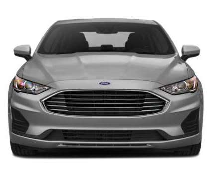 2019 Ford Fusion Hybrid SE is a Gold, White 2019 Ford Fusion Hybrid SE Hybrid in Rome GA