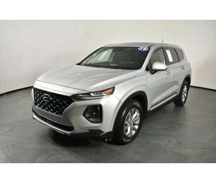 2019 Hyundai Santa Fe SE is a Silver 2019 Hyundai Santa Fe SE SUV in Orlando FL